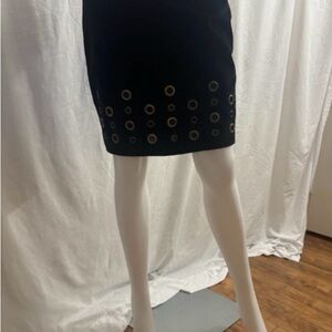 XOXO Black Mini Skirt with Gold Eyelets